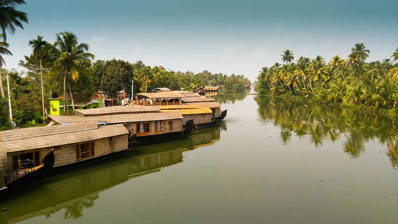 Kerala backwaters houseboat on a canal